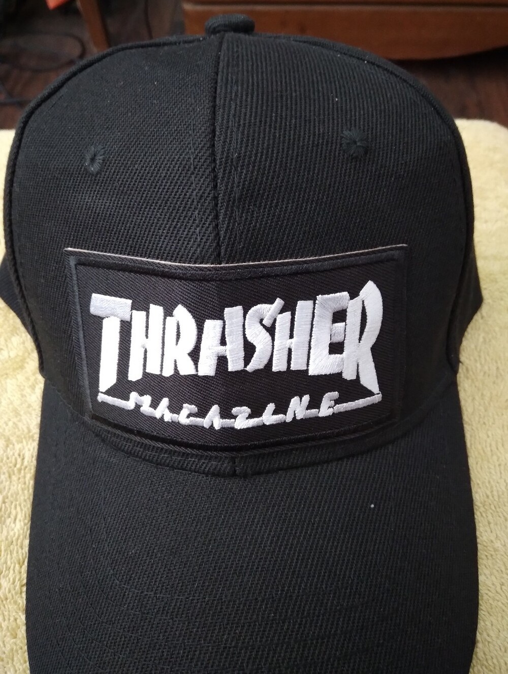 Thrasher Black Baseball Cap with White Logo Patch